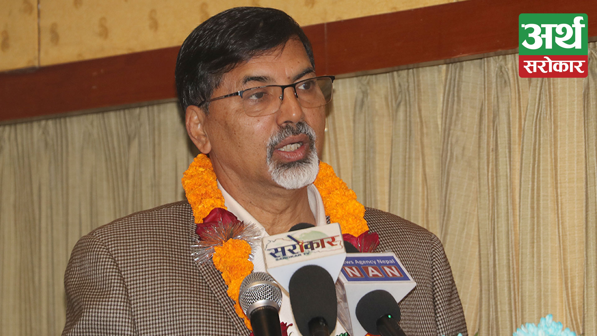 Finance Minister Sharma urges production of mobile phones in country